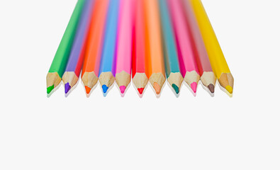 Colorful pencils isolated on a white background. Products for hobbies, creativity, and learning.