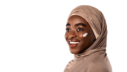 Beautiful muslim african american woman with cream on a cheek