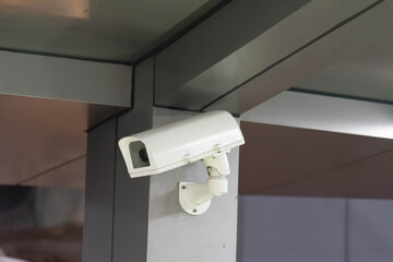 Obraz na płótnie Canvas Security CCTV camera at the public outdoor park. 