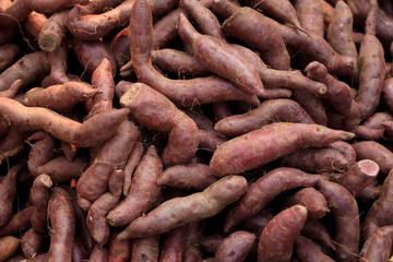 Purple sweet potato texture. Full Frame Shot Of Sweet Potatoes At Market.