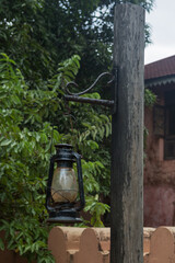 hanging old street lamp on a pole