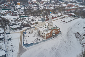 Scenic aerial view of Church of the Holy Trinity-on-Posad near ancient ruins of old Kremlin in small town Serpukhov in Moscow oblast in Russian Federation. Beautiful look of cathedral and fortress