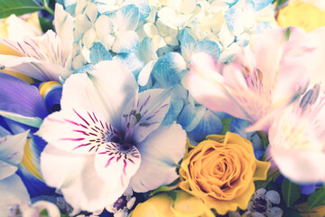Fototapeta na wymiar Colorful flowers bouquet . Mix flowers. The bouquet of mixed flower as a background, toned
