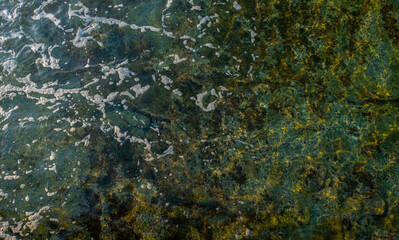 Beautiful sea waves with foam on the top of the water