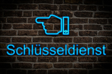 Obraz premium Leuchtreklame Schlüsseldienst