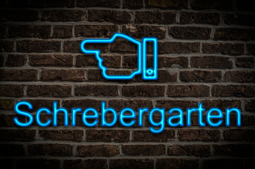 Fototapeta premium Leuchtreklame Schrebergarten