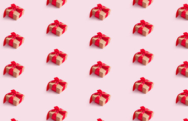 Present craft box with red ribbon bow, isolated on pink background. Seamless pattern