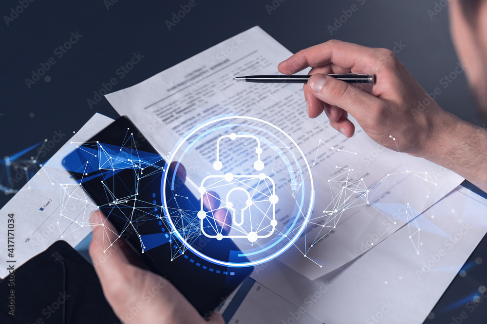 Poster a businessman in casual wear signing the contract to prevent probability of risks in cyber security.