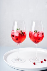 Cranberry rosemary spritzer drink.