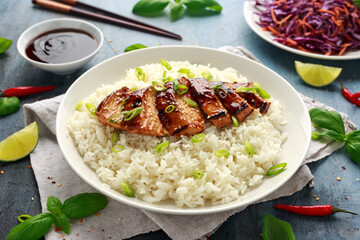 Teriyaki chicken with rice and red cabbage salad. Asian style food