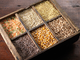 Legumes inside rustic wooden container