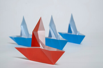 origami paper boat, conceptual for leadership, business, dreams, and successful