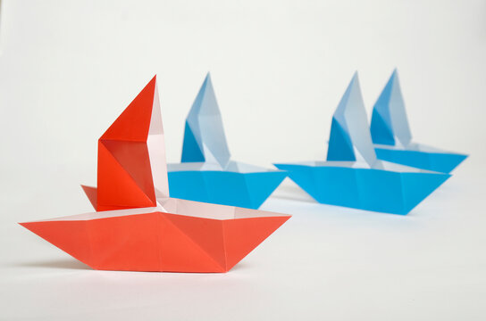 origami paper boat, conceptual for leadership, business, dreams, and successful