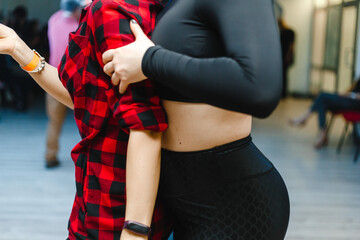 Kharkiv, Ukraine 21.02.21 Man and woman are dancing passionately salsa at class
