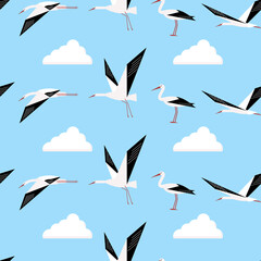 seamless pattern with flying white storks