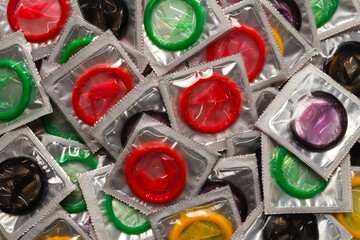 Colorful condoms background.