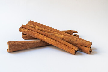 Cinnamon sticks isolated on white background, Cinnamon aroma spice pile
