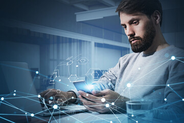 Double exposure of handsome businessman working with laptop and