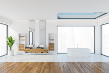 White and wooden bathroom with bathtub and two sinks near window