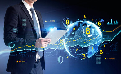 Businessman hands using tablet researching a business report of cryptocurrency market behaviour based on worldwide news. Business and financial success concept. double exposure.