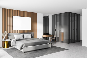 White bedroom interior with concrete floor, a gray bed and two bedside tables. A cabinet with mirrors. Poster on wooden wall. mock up