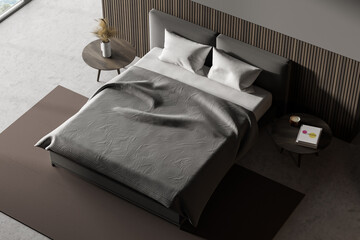 Top view of bedroom interior with king size bed and two tables. Blanket and pillows. 3d rendering.