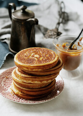 Classic American breakfast pancakes with various toppings