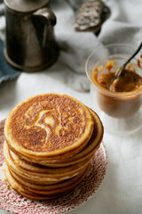 Classic American breakfast pancakes with various toppings
