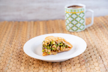 Arabic sweets named baklava filled with pistachio