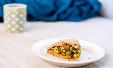 Arabic sweets named baklava filled with pistachio