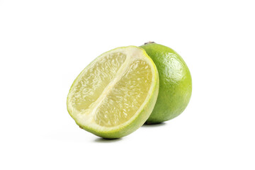 Whole and sliced limes isolated on white background. Sour green fruit 