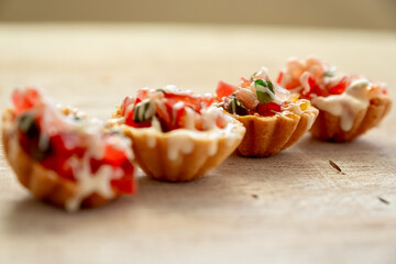 Valentine cupcakes with red colors and brown background