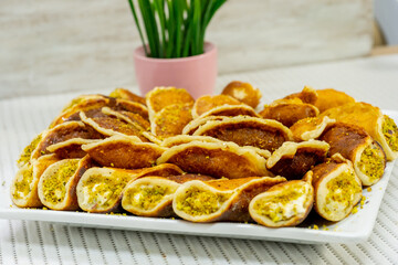 Ramadan sweets qatayef with white background