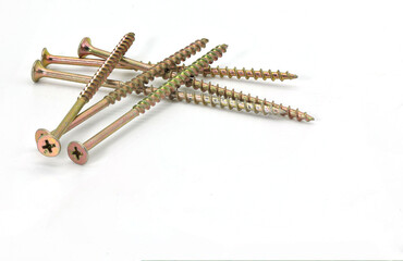 yellow large self-tapping screws on a white background