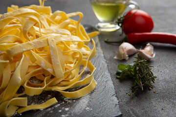 Italian pasta cooking process. Fresh food concept. Home made tagliatelle