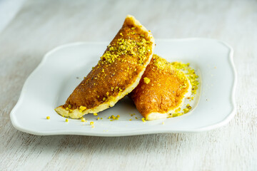 Ramadan sweets qatayef with white background