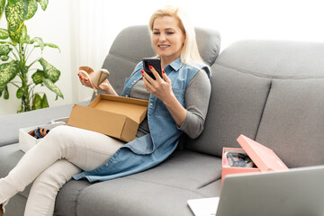 Beauty woman using laptop and phone. Business and Technology concept. Delivery and Online shopping...