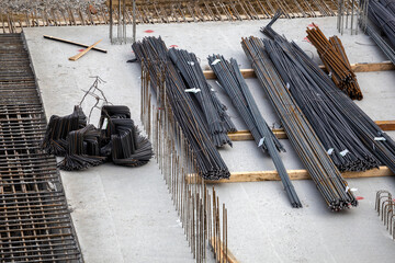 Steel rods and bars used to reinforce concrete for construction