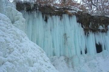 waterfall frozen during wintertime