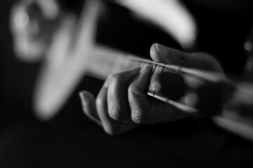 woman's hand playing the traditional turkish instrument 