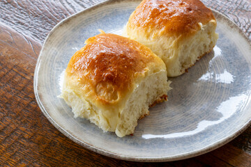 homemade bread with condensed milk on the plate.