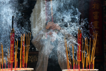 Taoist temple. Phuoc An Hoi Quan Pagoda. Incense sticks on joss sticks. Buddhist Worshipper. Ho chi...