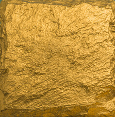 Gold texture. Rough structure mineral. Rock texture. Gold Ore. Gold rocks. Stone background.