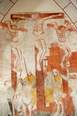 Vault de Lugny church.  16th century fresco. Jesus on the cross. The crucifixion.  Christ in his...