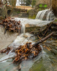 Fototapeta na wymiar Small Creek waterfalls in St louis, Mo