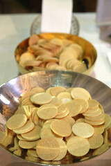 Catholic mass. Eucharist table.  Wafers.  France.  22.03.2018