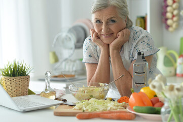 Senior woman chef portrait at kitchen