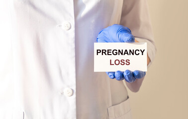 Pregnancuy loss concept, inscription. Miscarriage word