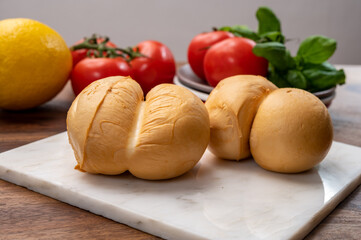 Cheese collection, Italian yellow smoked caciocavallo or scamorza cheese