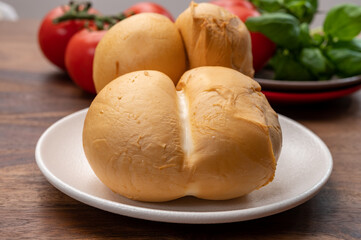 Cheese collection, Italian yellow smoked caciocavallo or scamorza cheese